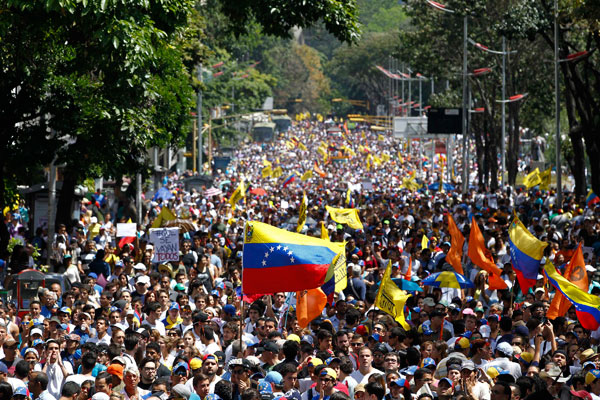 At least 2 killed by gunfire at Venezuela protests