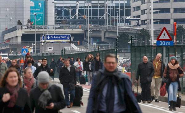 Belgium on high alert, China condemns attacks