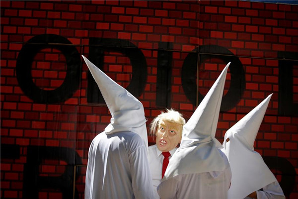 Thousands of demonstrators across US say 'Not My President'