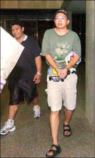 大陸游客被指偷拍臺軍機密營區(qū)遭逮捕(組圖)