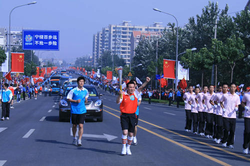 全運會火炬?zhèn)鬟f結束 主火炬16日晚點燃[圖]